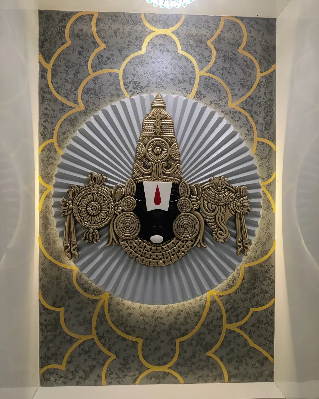Decorative pooja feature wall with an ornate devotional centrepiece in the Arbour Bonsai home