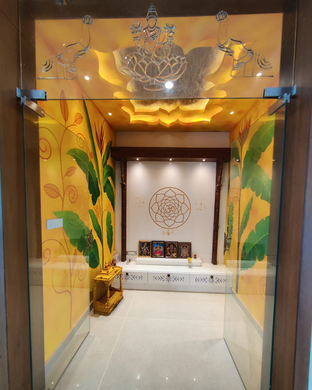 Traditional pooja room with decorative framing